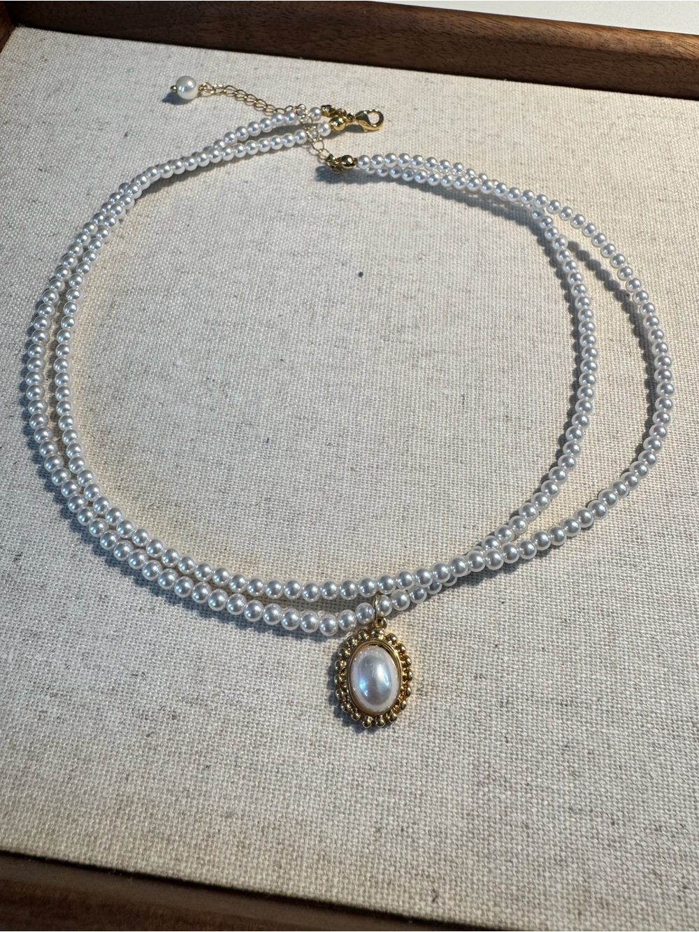 Elegant White Pearl Double-Strand Necklace with Gold Pendant